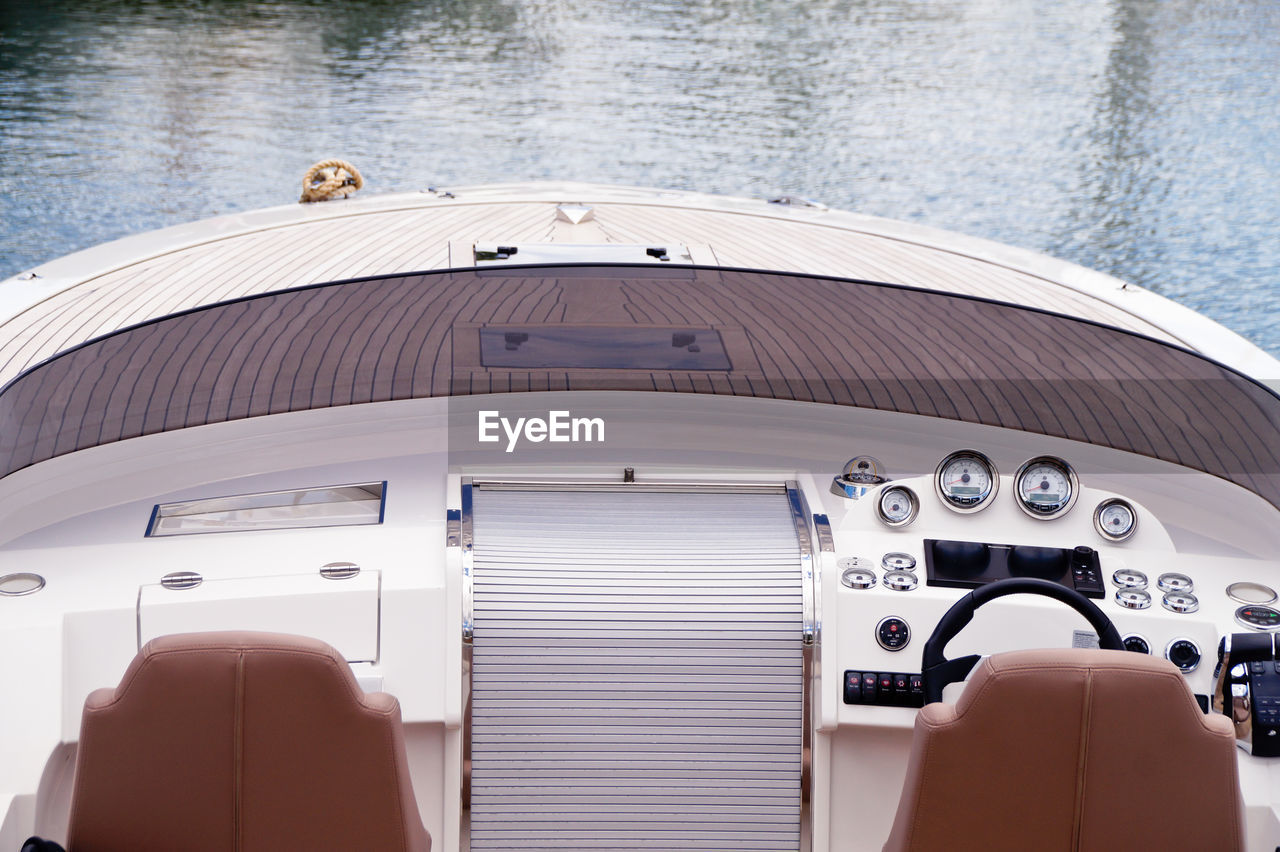 HIGH ANGLE VIEW OF CAR BY SEA