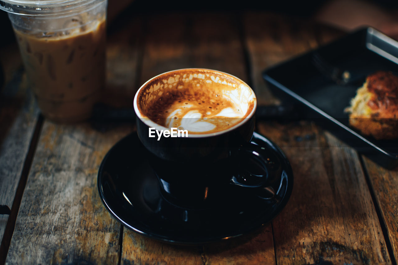 Close-up of coffee cup on table