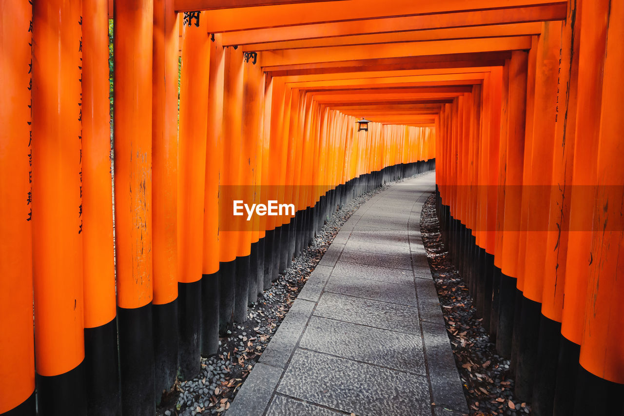 VIEW OF WOODEN BOARDWALK LEADING TOWARDS TEMPLE