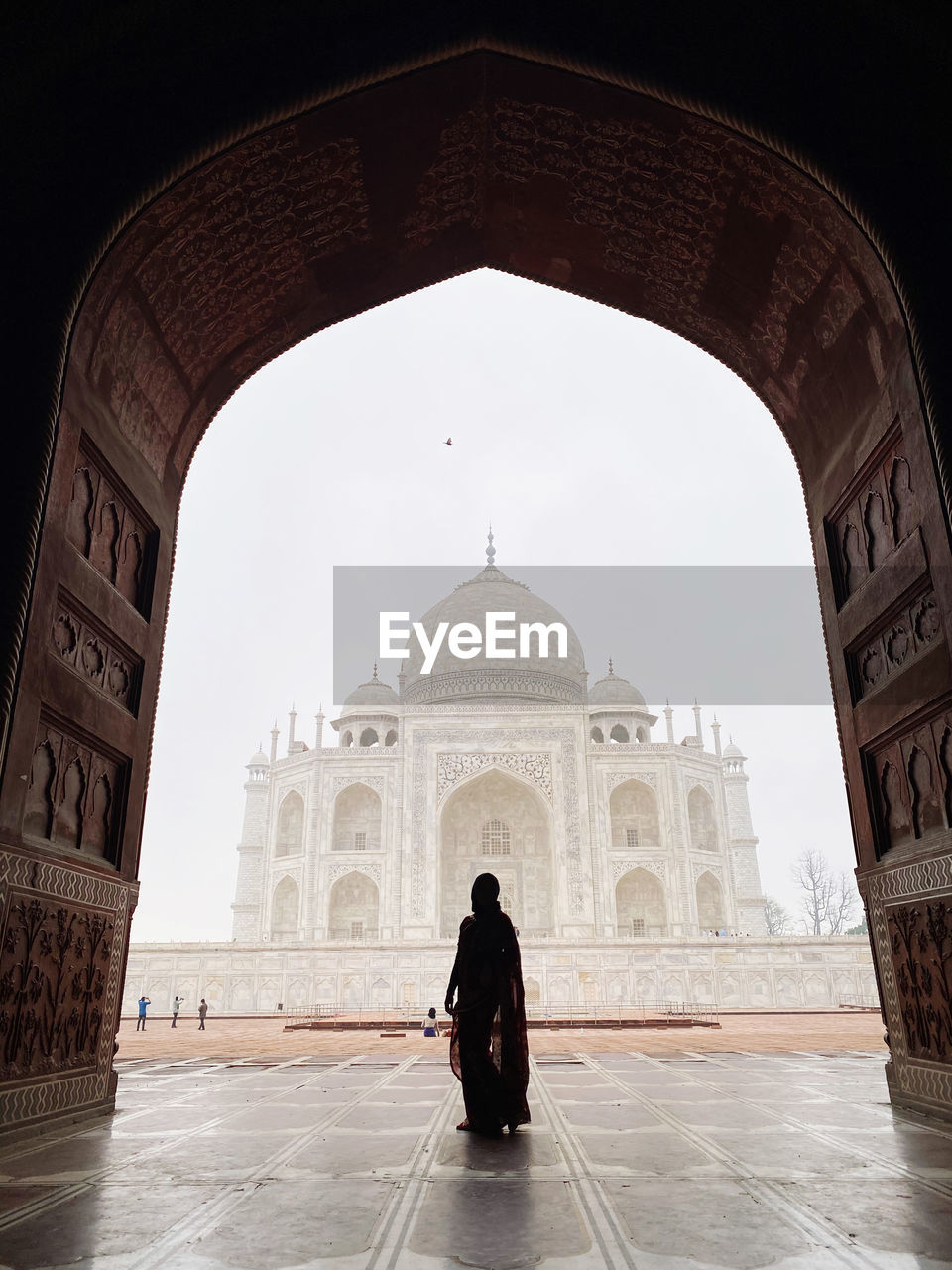 Rear view of woman in temple