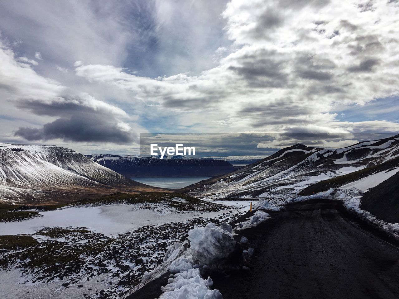 Scenic view of mountains against sky during winter