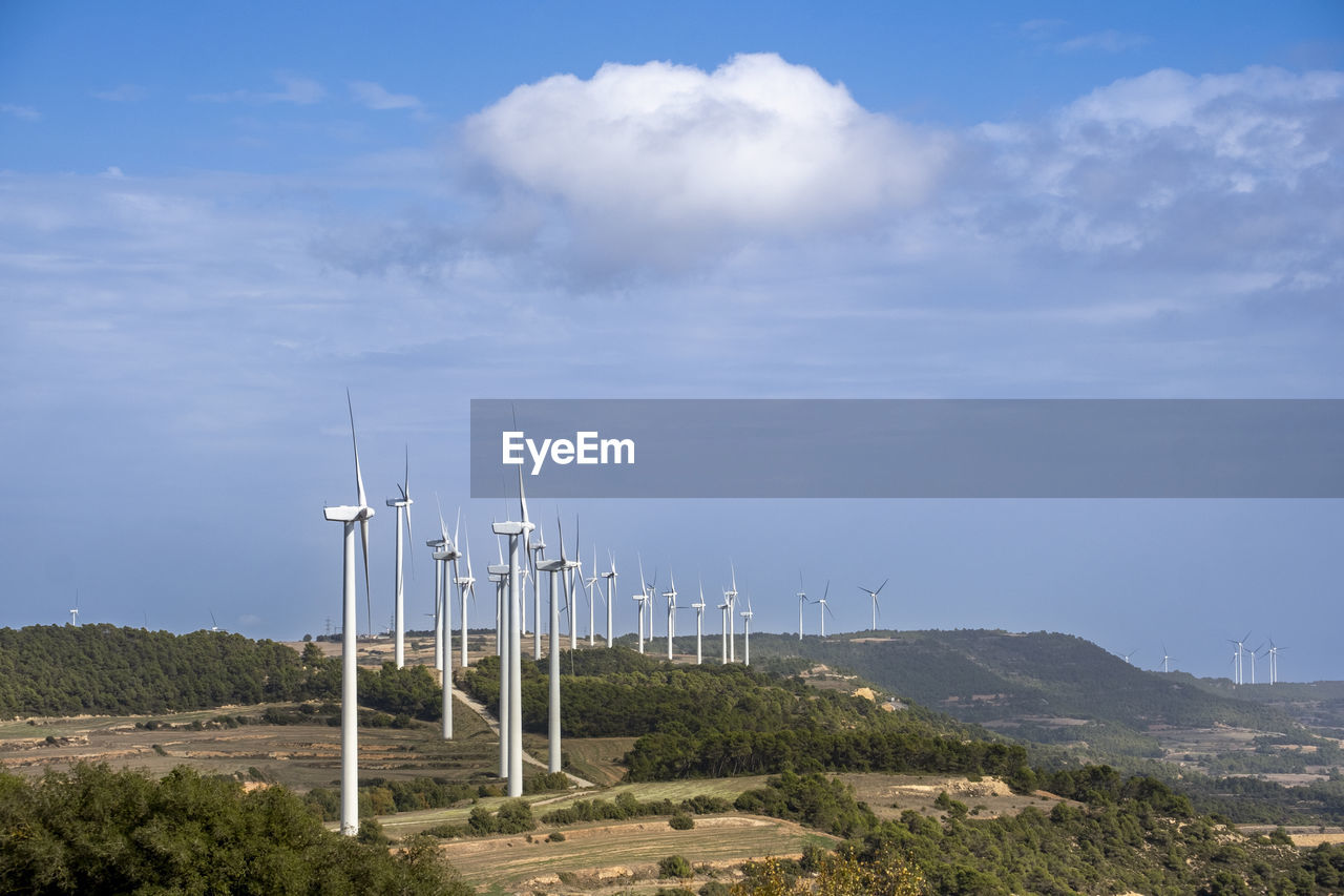 Wind turbine in agricultural fields in the province of tarragona in catalonia spain