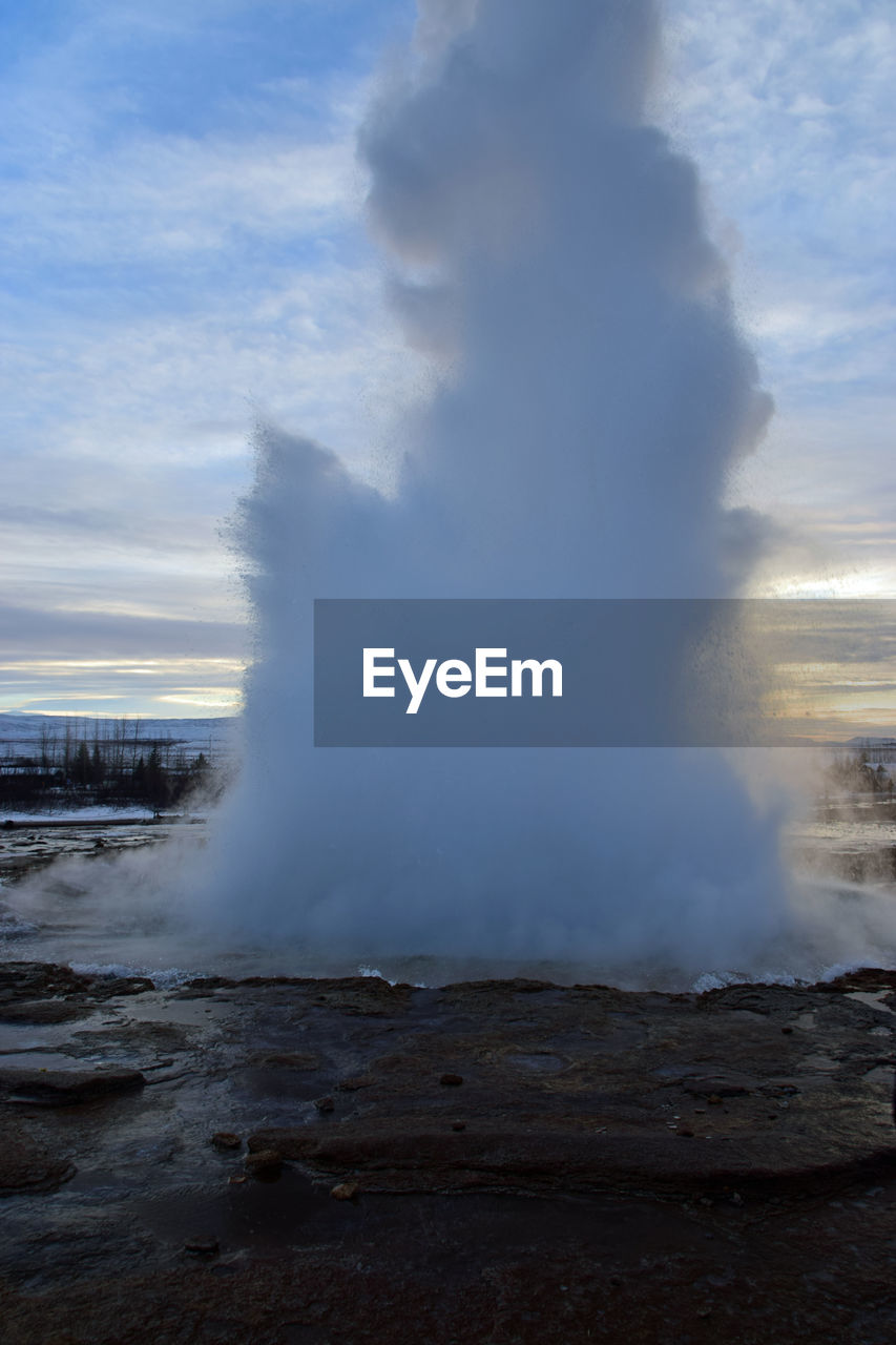 SCENIC VIEW OF CLOUDS OVER WATER