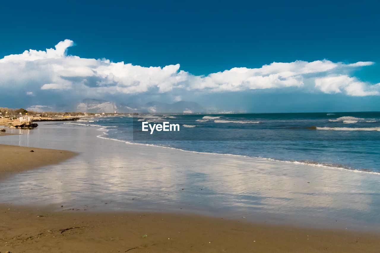 Scenic view of beach against sky