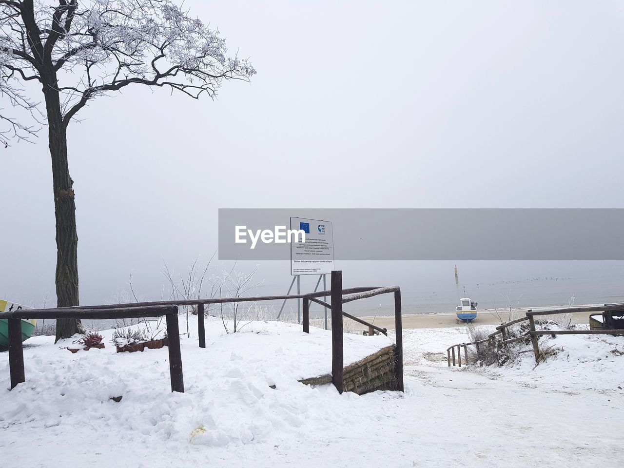 SCENIC VIEW OF SNOW COVERED LANDSCAPE AGAINST SKY