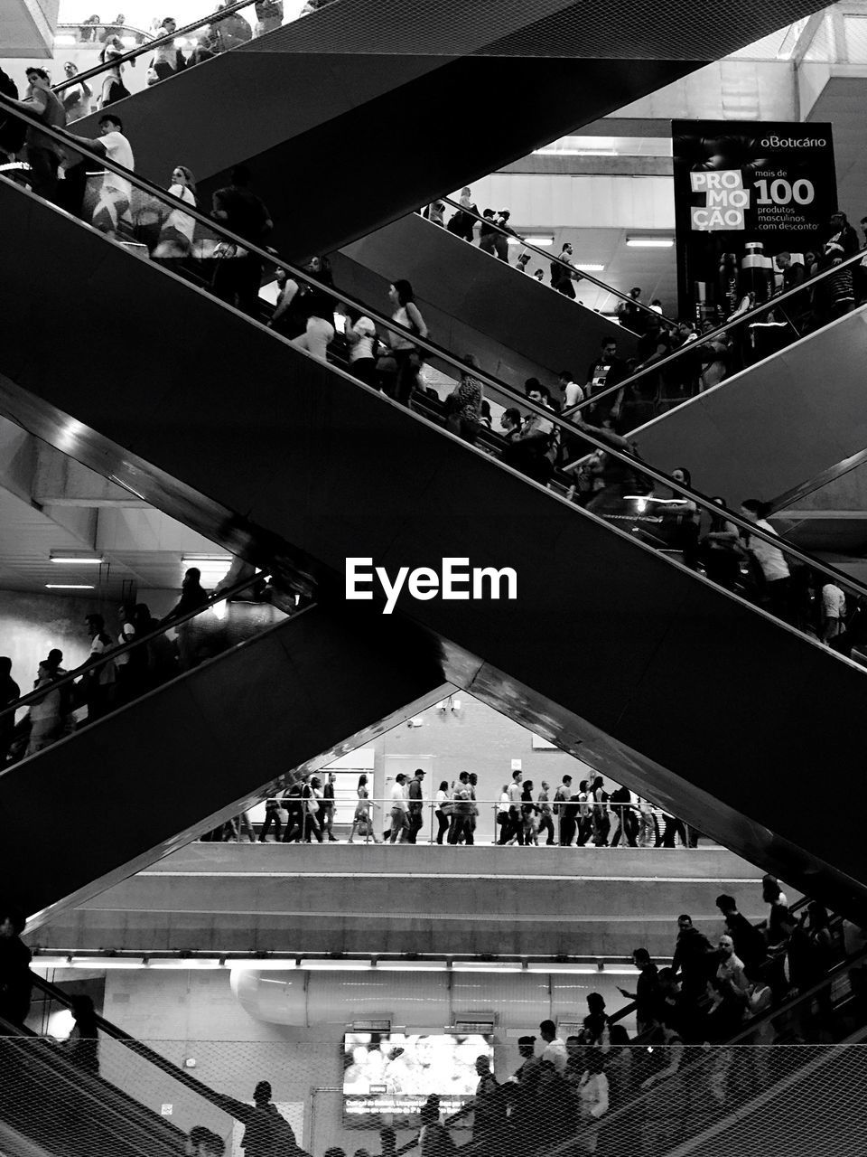 PEOPLE WAITING IN SUBWAY STATION