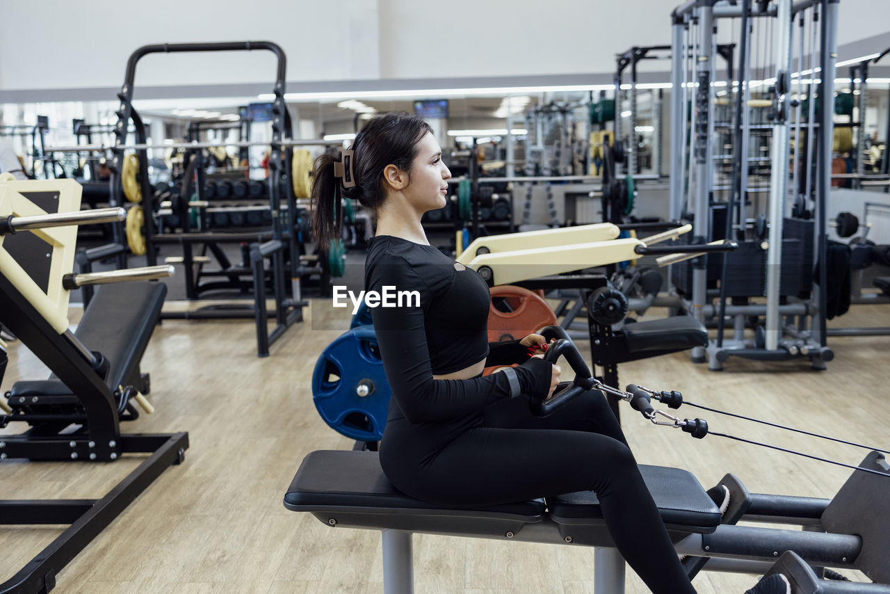 woman exercising in gym