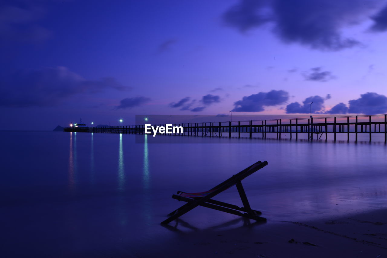 Scenic view of sea against sky at night