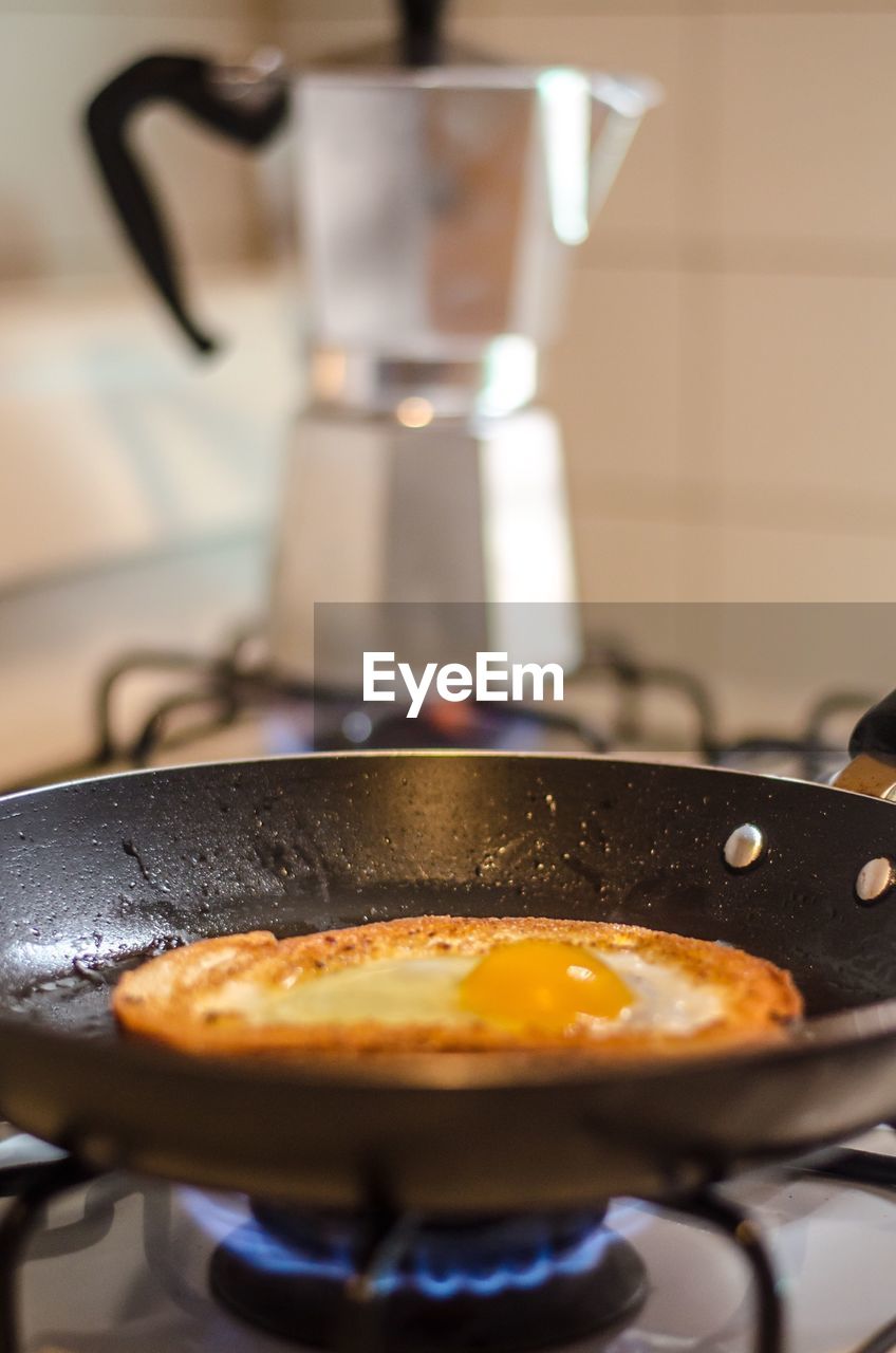 Close-up of omelet in pan on stove
