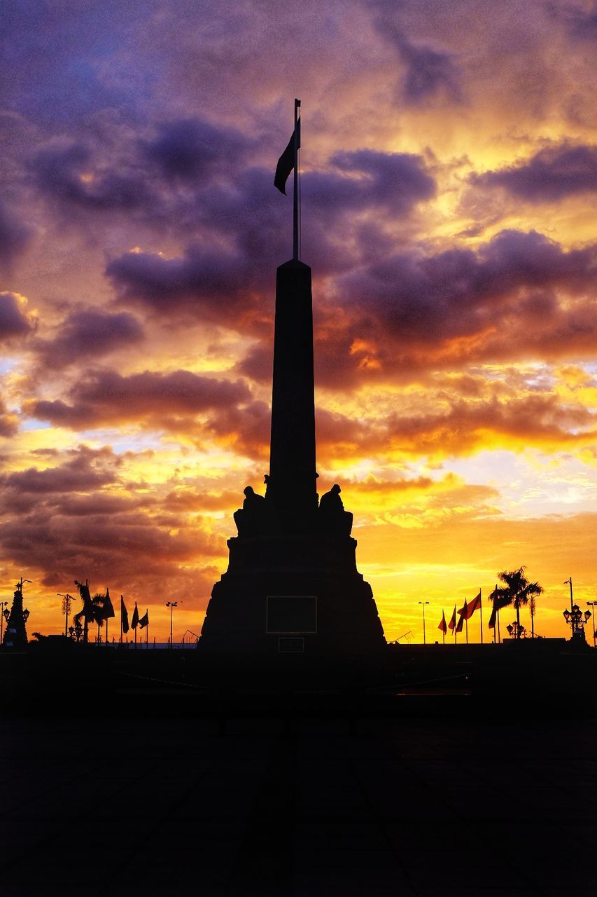 SILHOUETTE OF MONUMENT DURING SUNSET