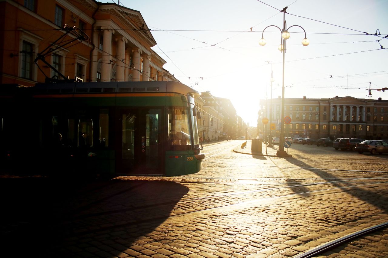 View of street in city against sky