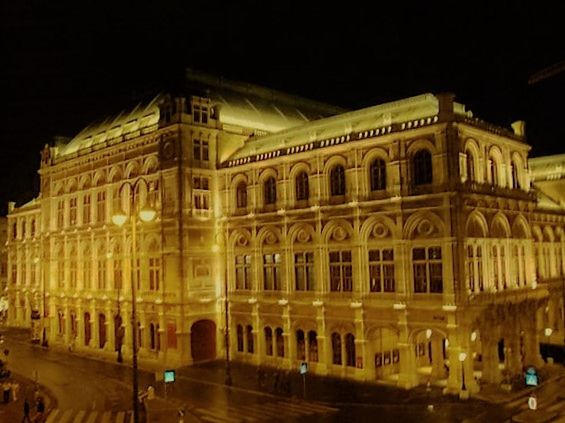 VIEW OF ILLUMINATED BUILDING AT NIGHT