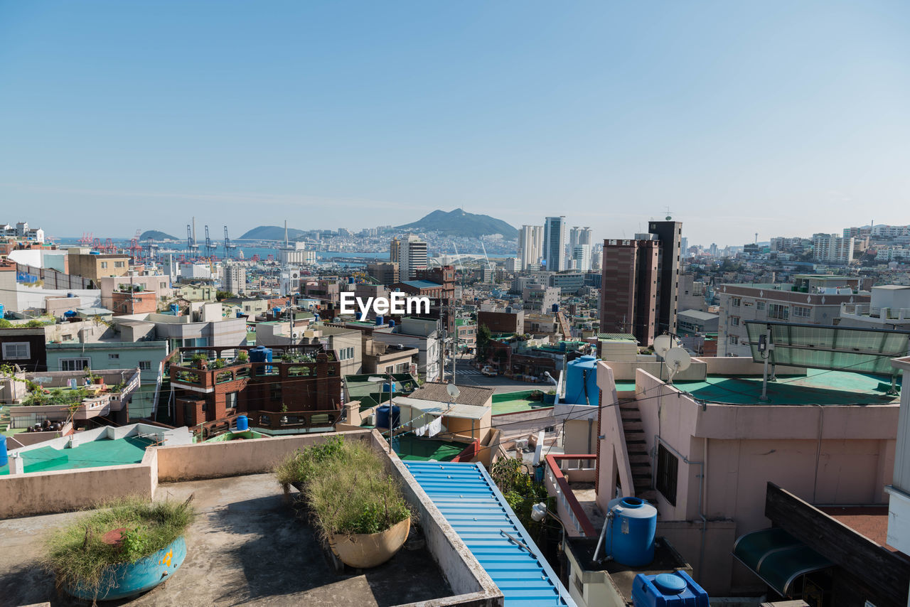 High angle view of town against clear sky