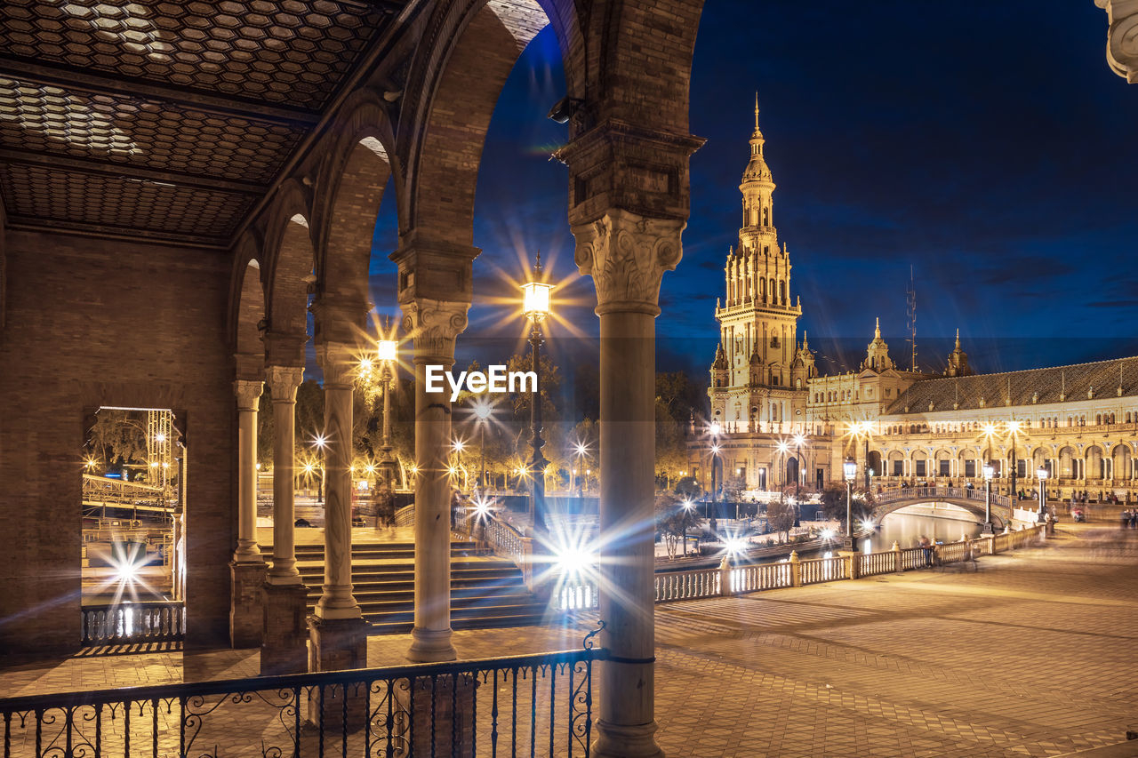 VIEW OF ILLUMINATED BUILDINGS AT NIGHT