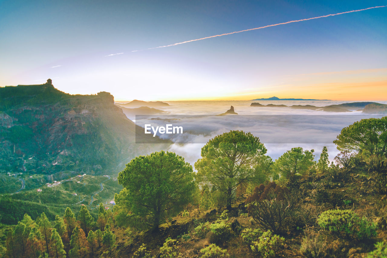 Scenic view of mountains at sunset