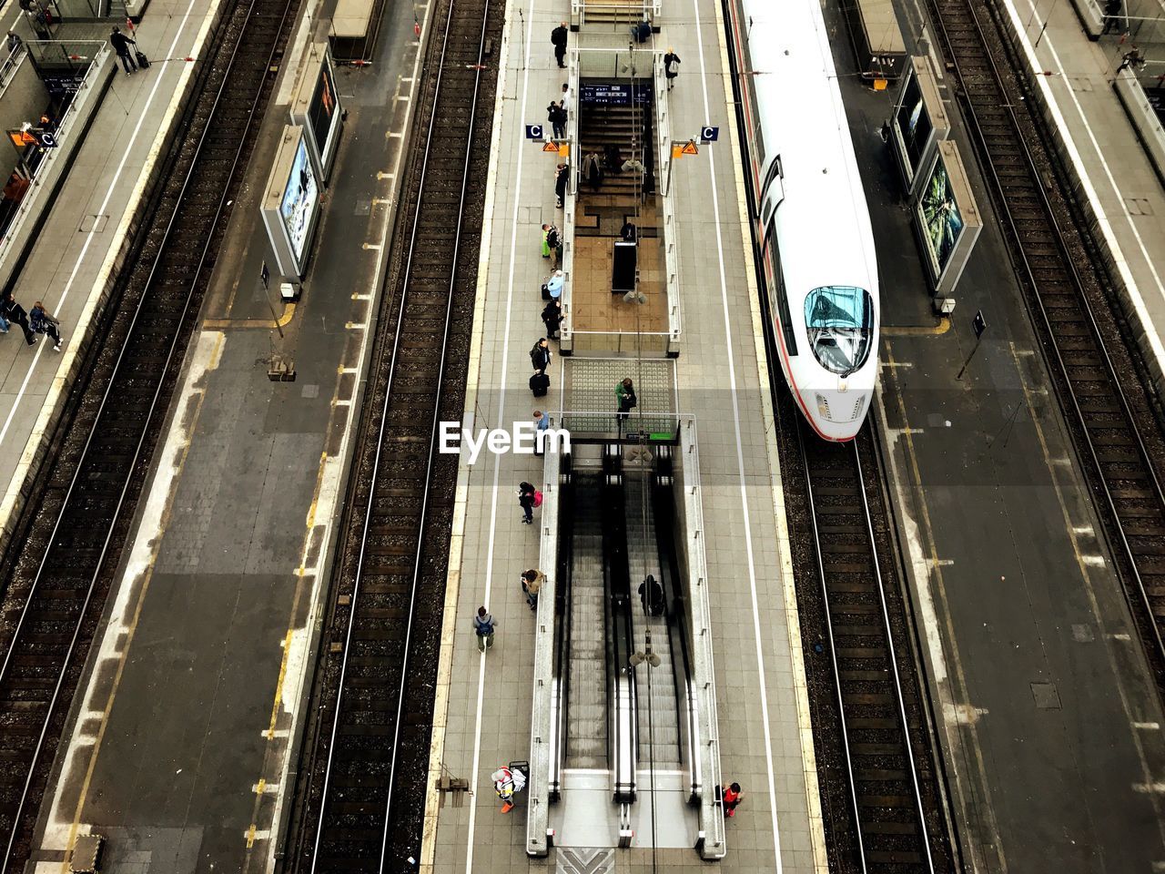 HIGH ANGLE VIEW OF RAILROAD TRACKS IN CITY