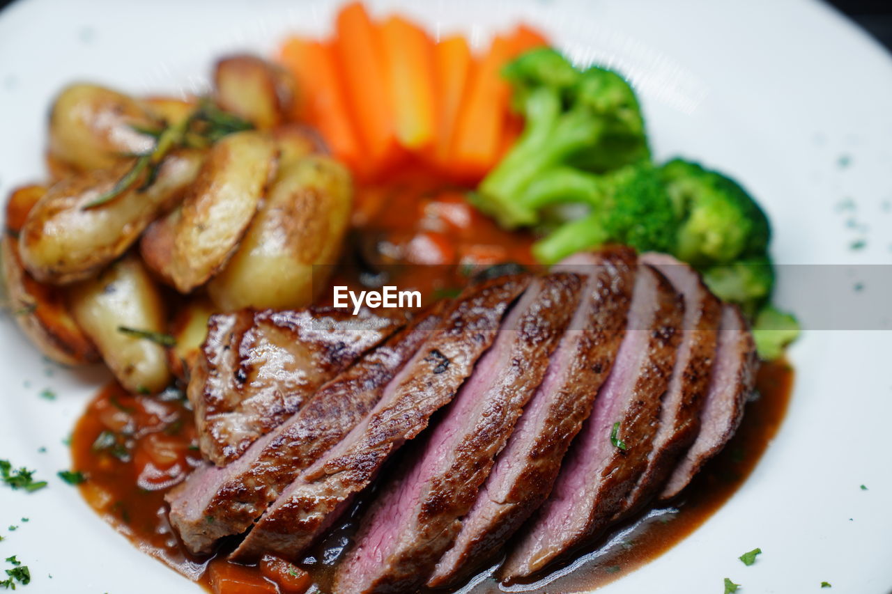 CLOSE-UP OF MEAL SERVED ON PLATE