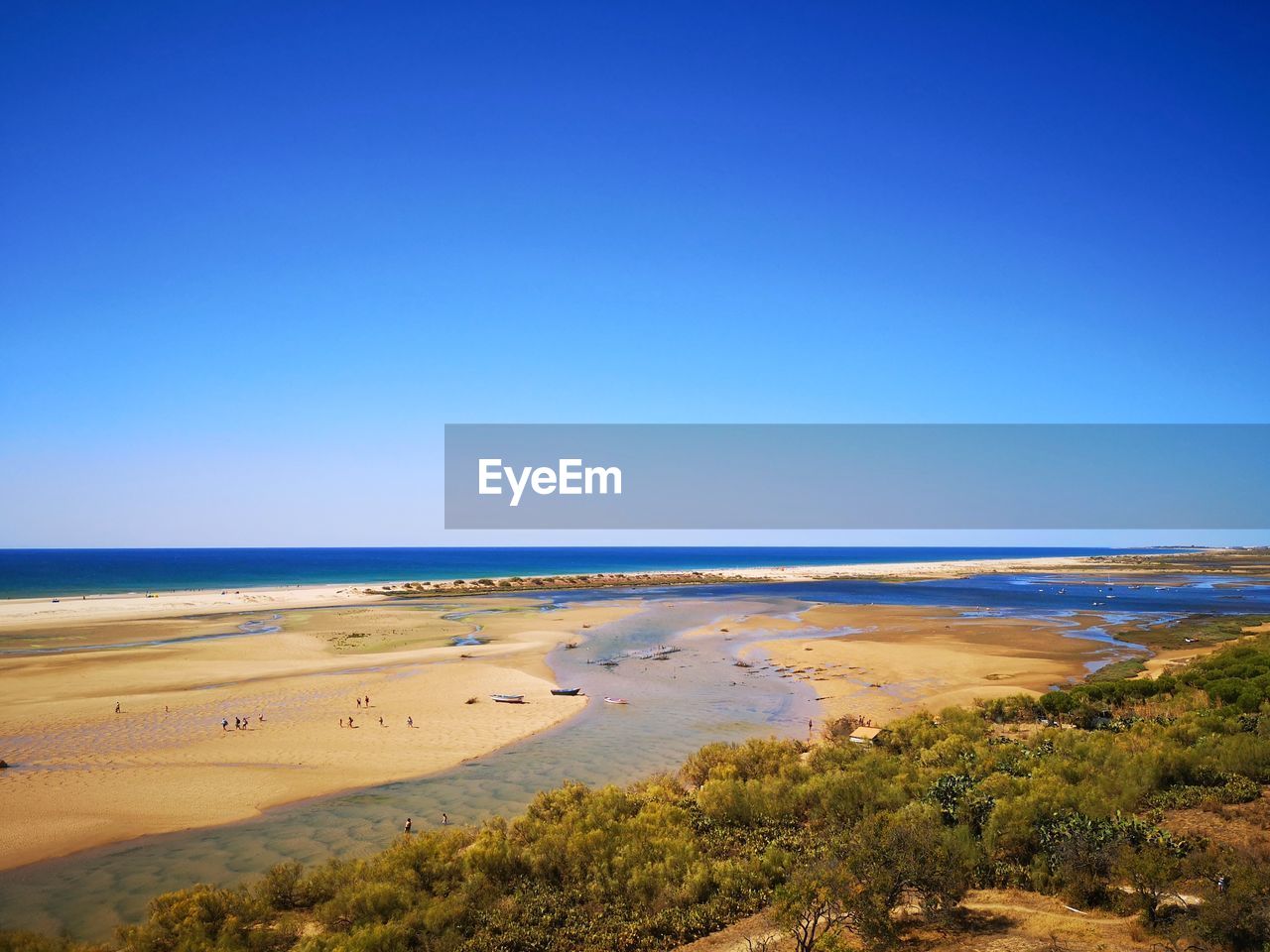 SCENIC VIEW OF SEA AGAINST BLUE SKY