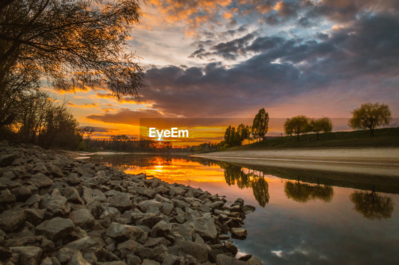 Scenic view of landscape against cloudy sky