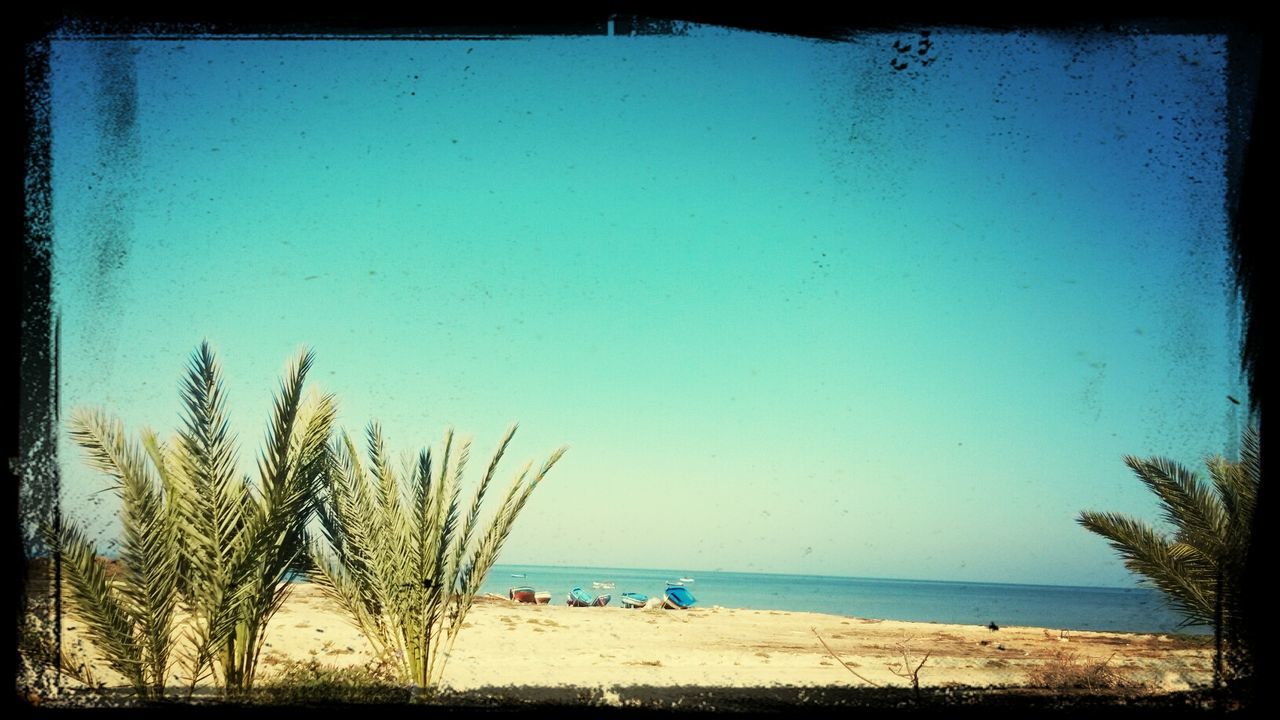 SCENIC VIEW OF SEA AGAINST BLUE SKY