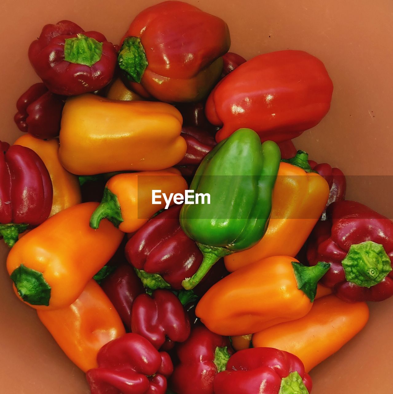 Close-up of multi colored bell peppers in bowl