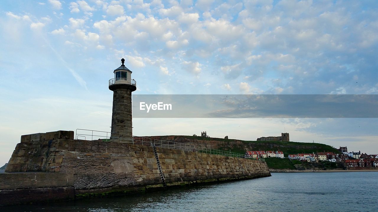 LIGHTHOUSE AT WATERFRONT