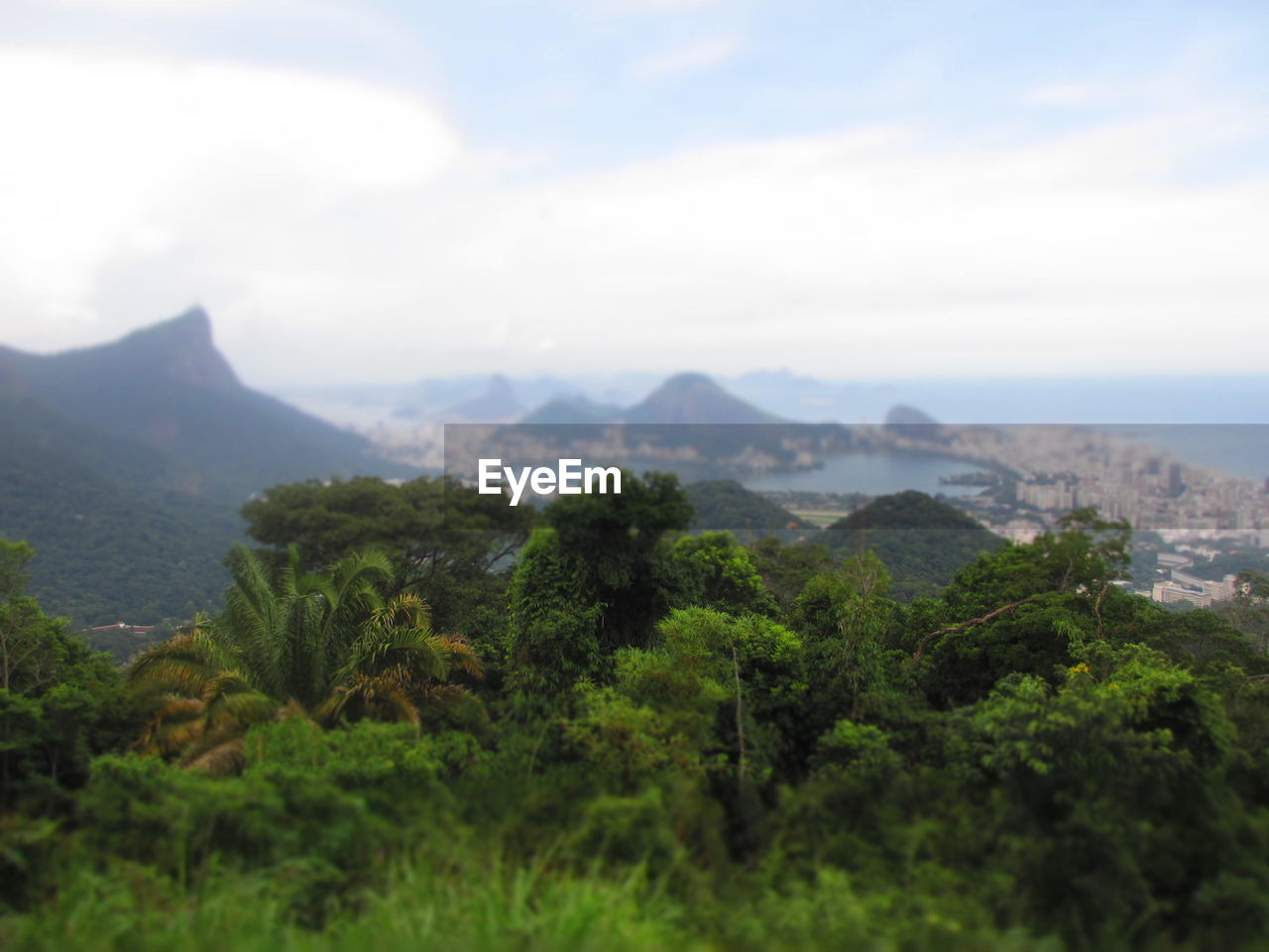 Scenic view of landscape against cloudy sky