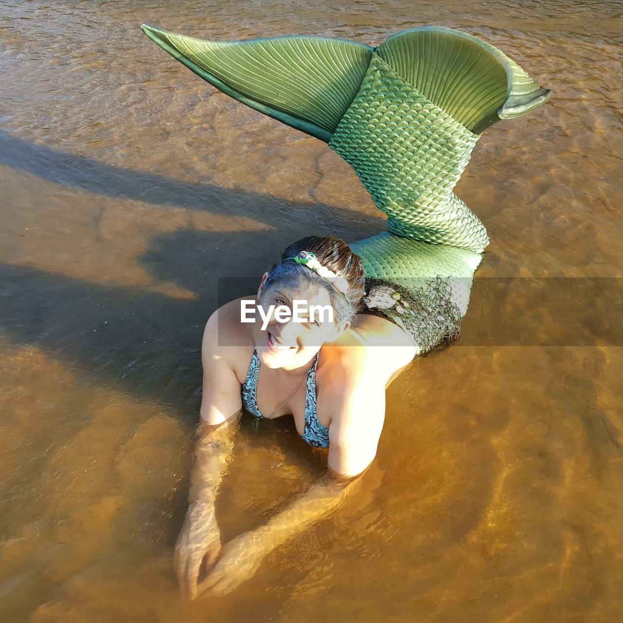 WOMAN SWIMMING IN WATER