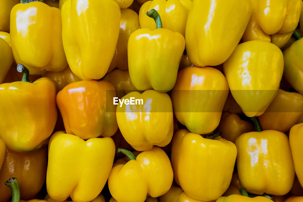 FULL FRAME SHOT OF YELLOW BELL PEPPERS