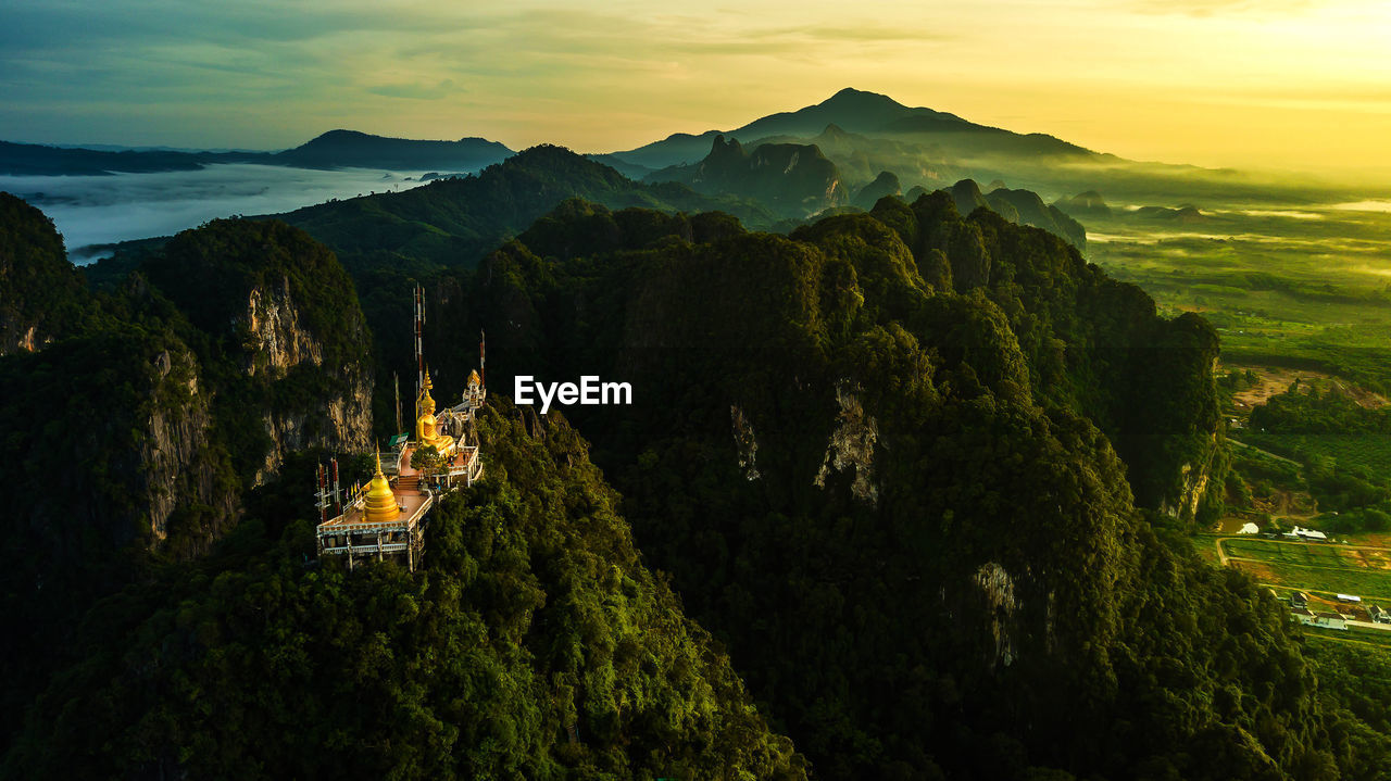 Scenic view of mountains against sky during sunset