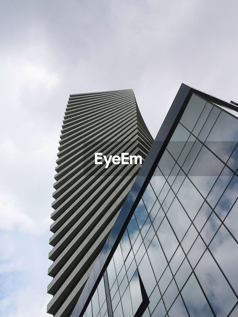 Low angle view of modern buildings against sky