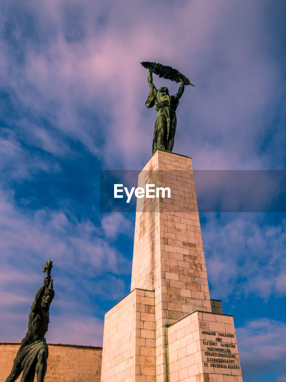 LOW ANGLE VIEW OF STATUE