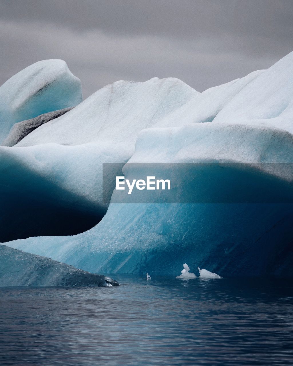 Iceberg in sea during winter