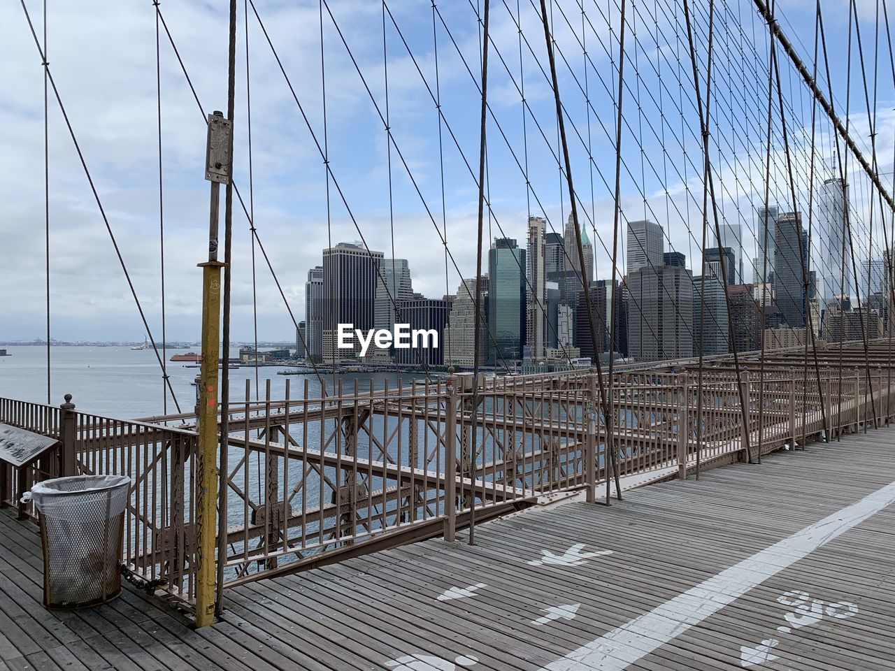 View of suspension brooklyn bridge in city