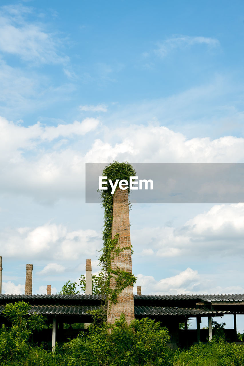 An old castle that rises up into the sky yes bricks made it's a deserted place in thailand.