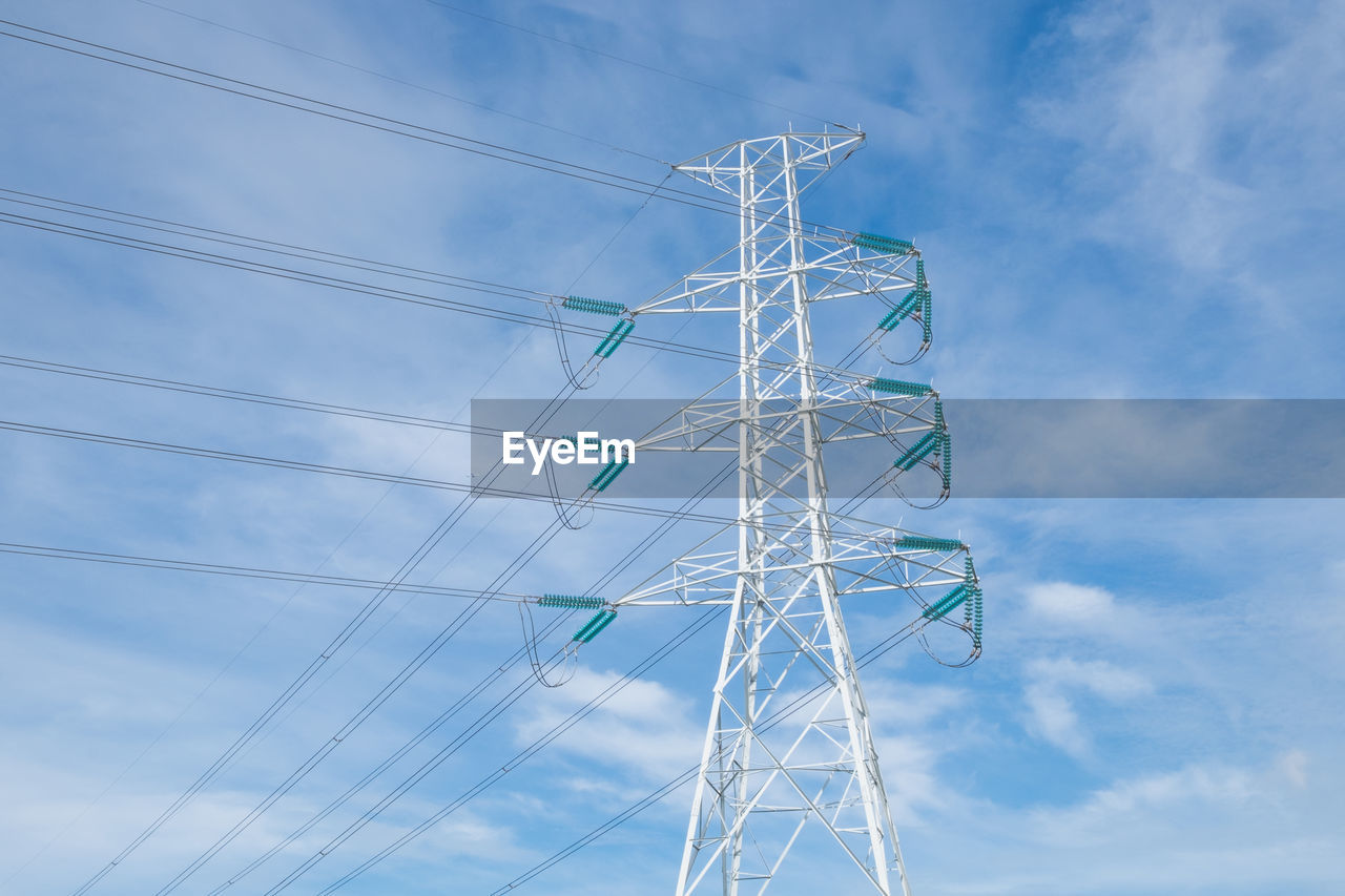 High voltage post, high voltage tower at blue sky background