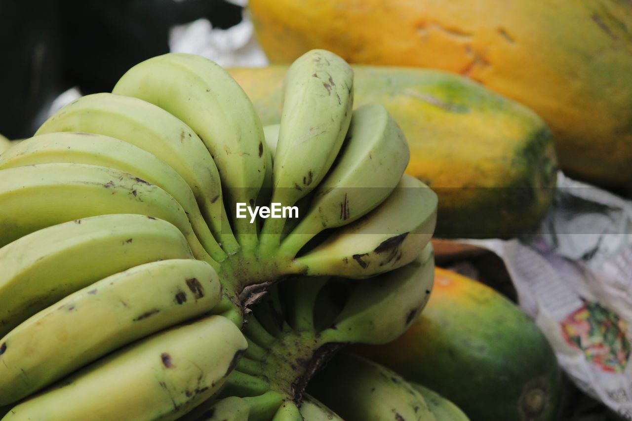 CLOSE-UP OF BANANAS FOR SALE IN MARKET