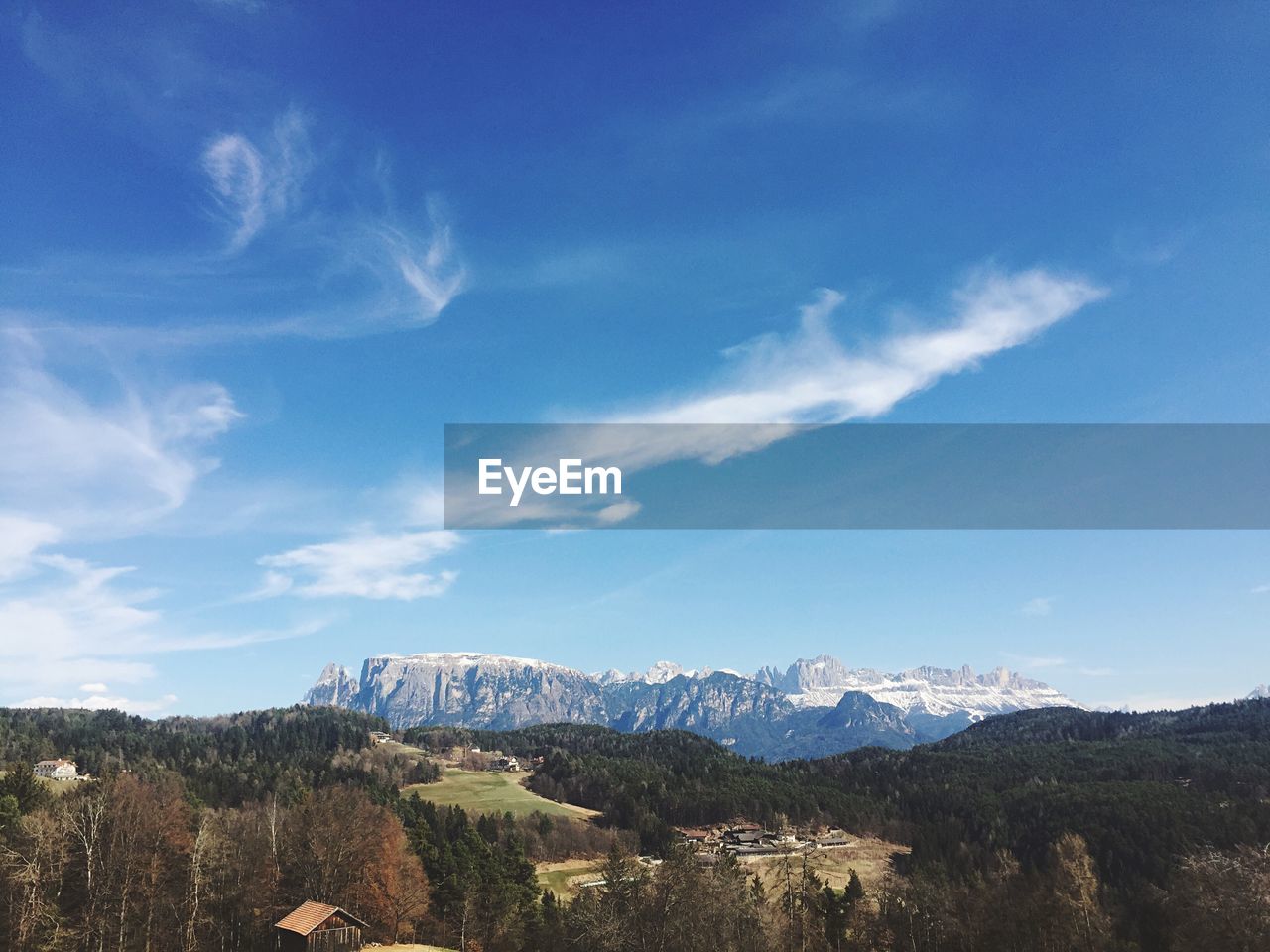 VIEW OF MOUNTAIN AGAINST CLOUDY SKY