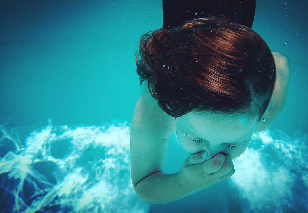 Close-up of boy in swimming pool