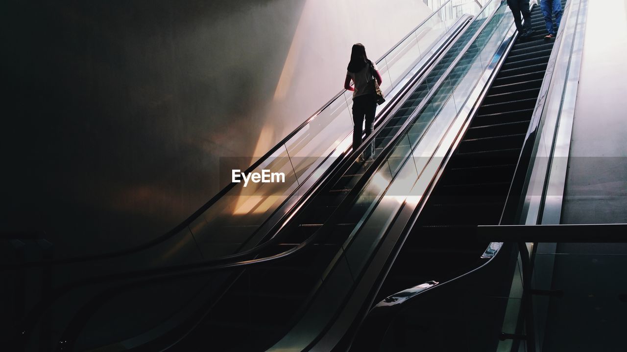 Low angle view of person on elevator 