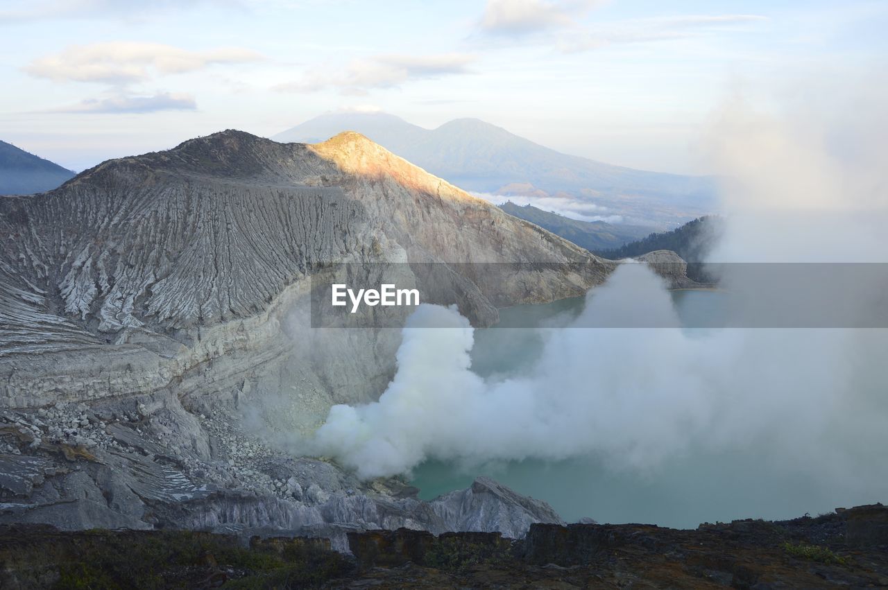 Volcanic landscape against sky