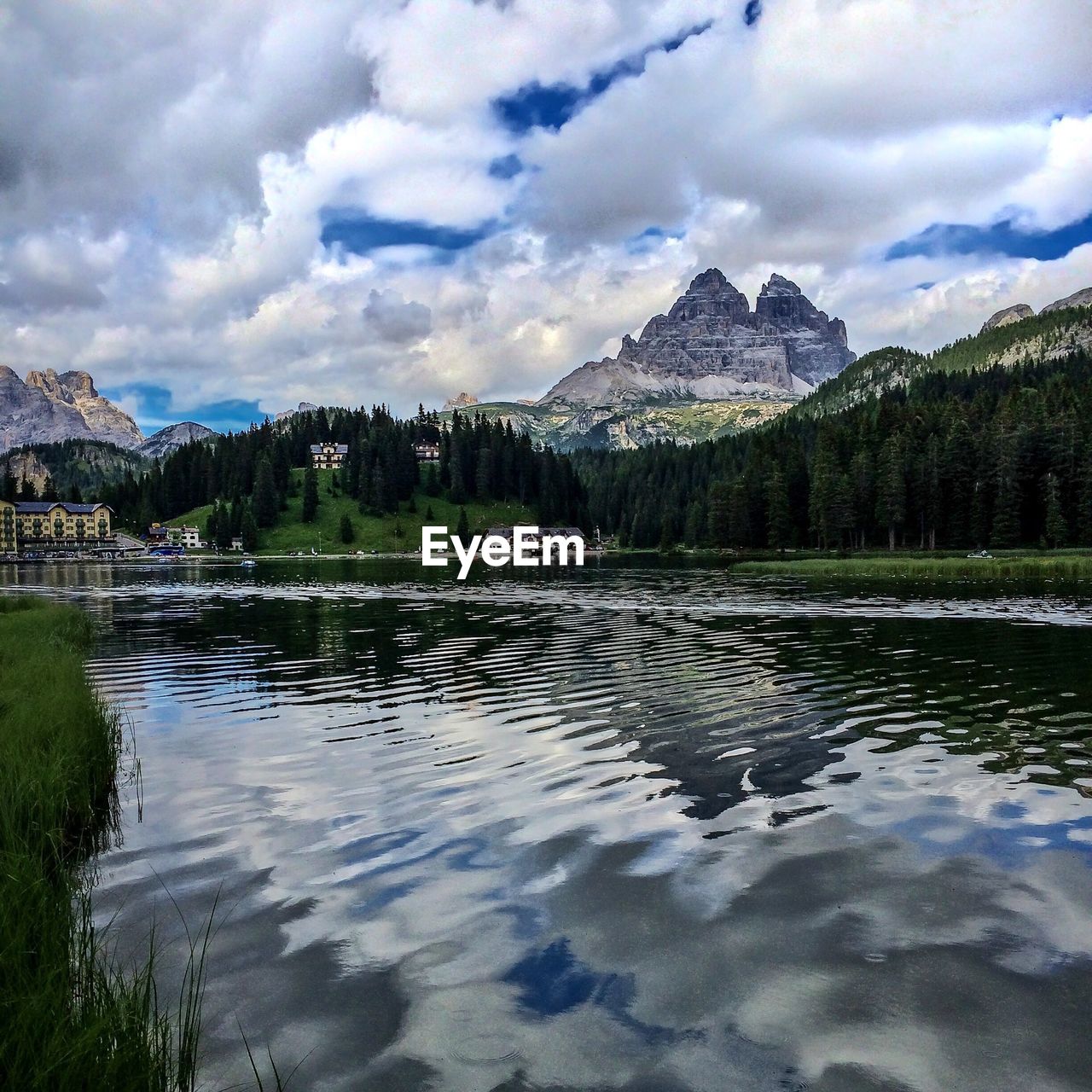 Scenic shot of reflection of clouds in lake