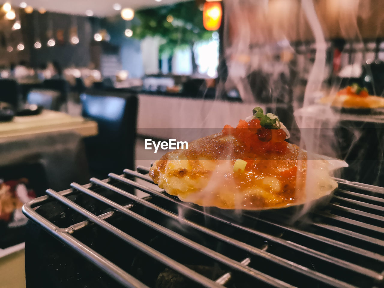 Close-up of meat on barbecue grill