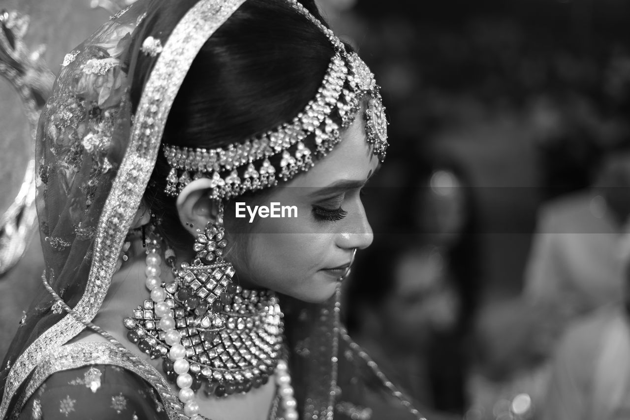 High angle view of beautiful bride wearing jewelries