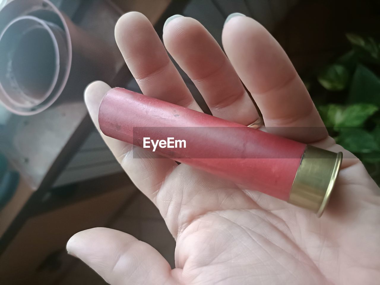 hand, finger, lip, pink, nail, one person, human eye, close-up, holding, skin, cosmetics, indoors, healthcare and medicine, lifestyles