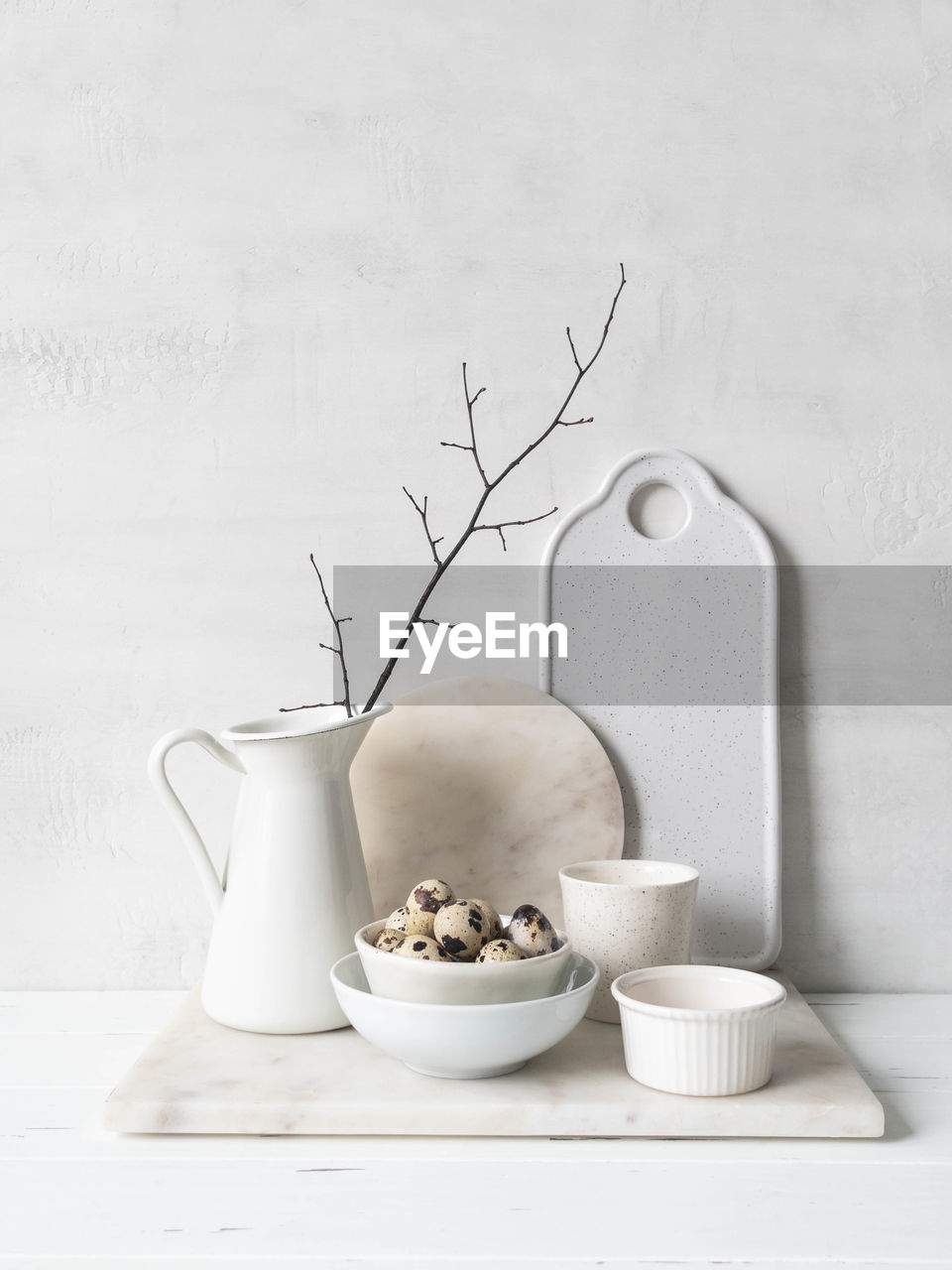 White cottage kitchen decoration. still life of various white dishes on a white background. 