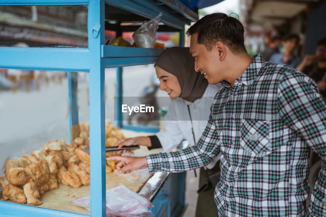 side view of man working at restaurant