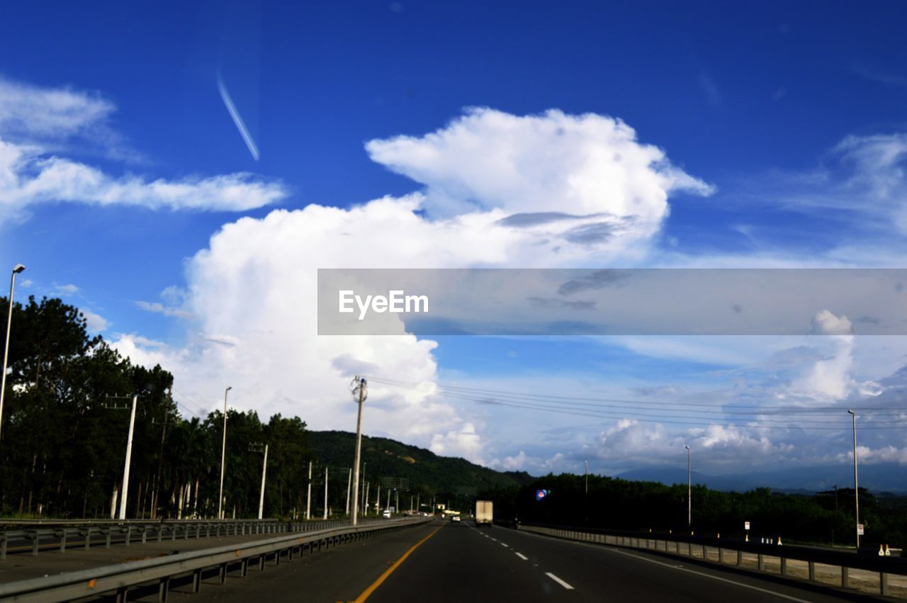 PANORAMIC VIEW OF ROAD AGAINST SKY