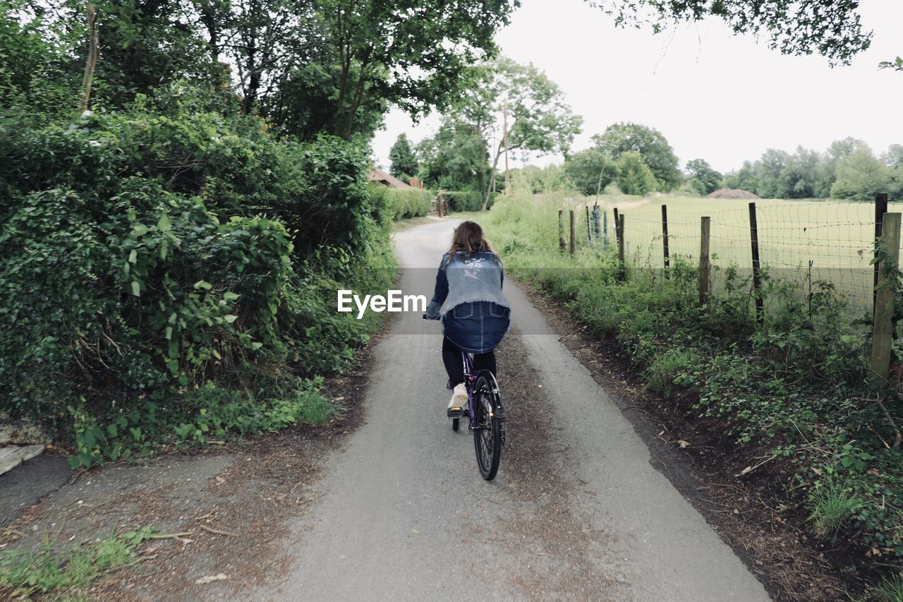 Portrait of a girl riding a bike