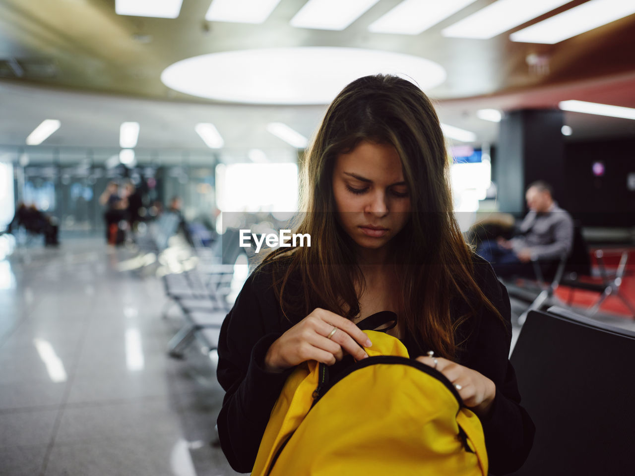 WOMAN LOOKING AT CAMERA